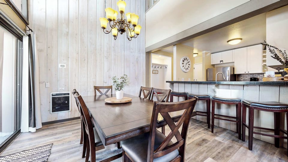 Dining table with seating for 6 and additional counter seating 