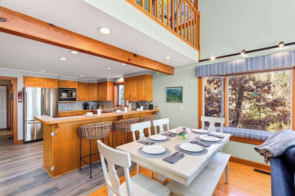 Open concept living room, dining room, and kitchen