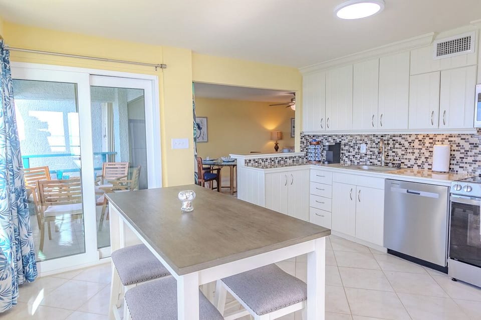 Bring home-cooking to the island with this fully furnished kitchen and seating. 