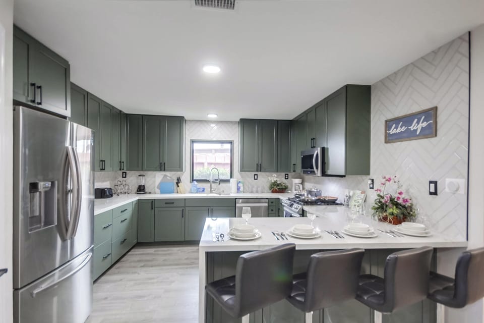 Share meals or set up a makeshift workspace in the spacious kitchen island