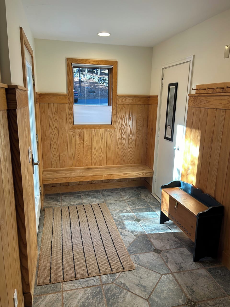 Mudroom with heated floor.