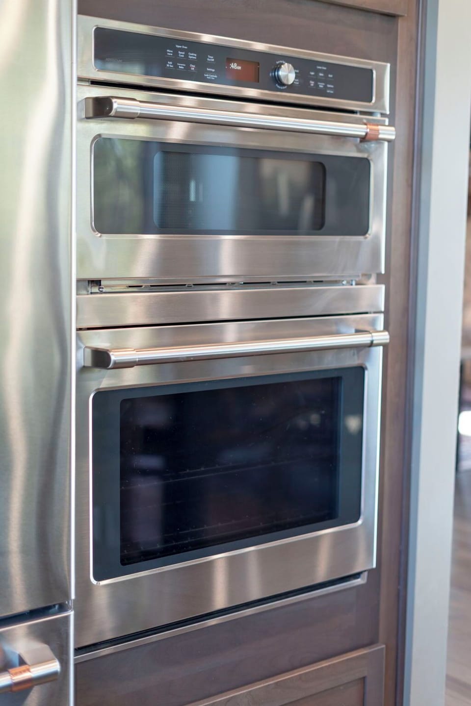 Microwave/oven top unit and bottom electric oven.