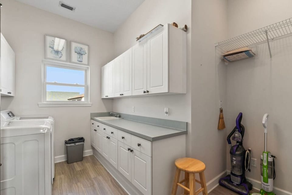 Laundry room with washer and dryer for extended stays