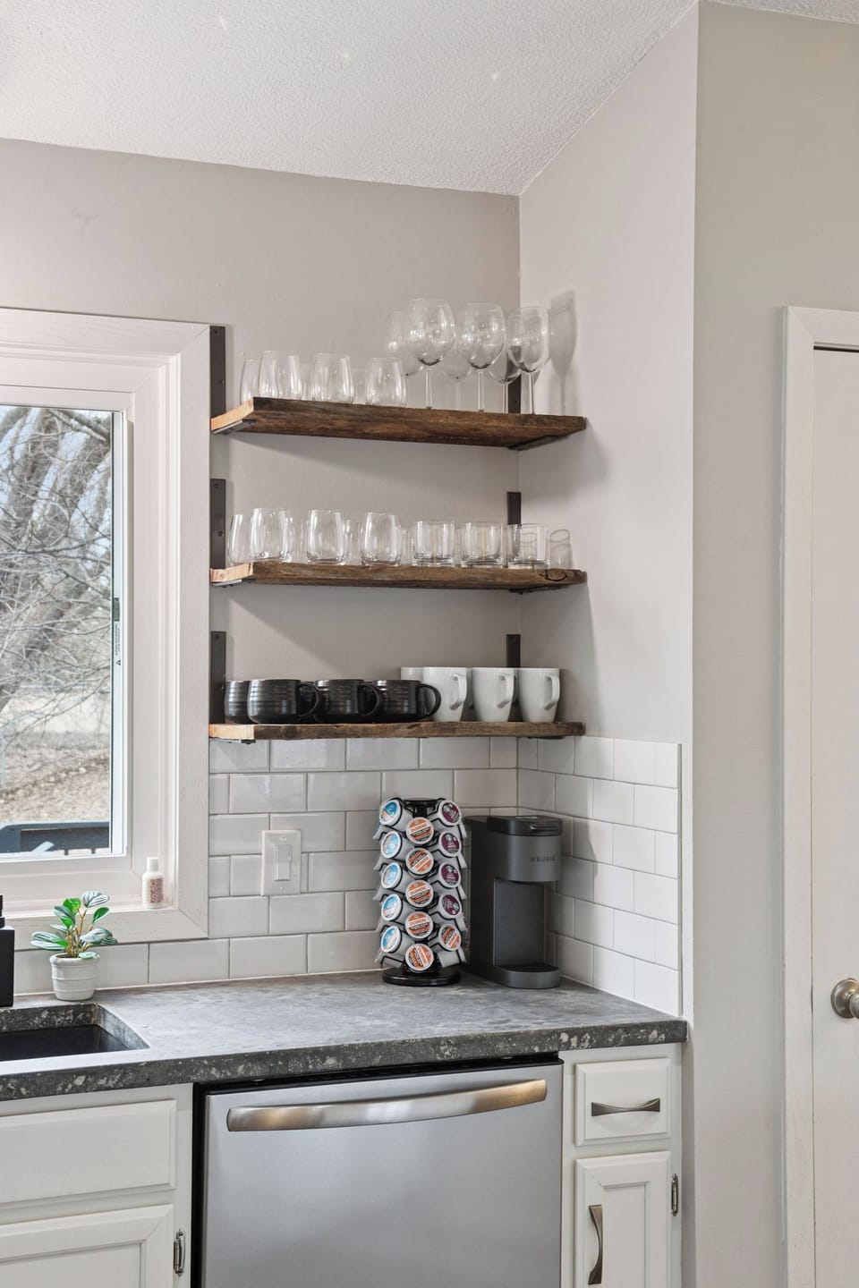 Coffee bar area - Kcups provided. 10 cup coffee pot, grinder and Bodum as well