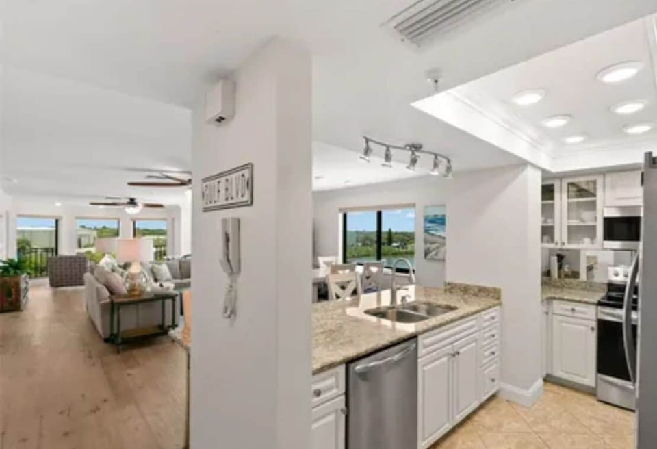Kitchen has dishes, pots, utensils and all small and large appliances.