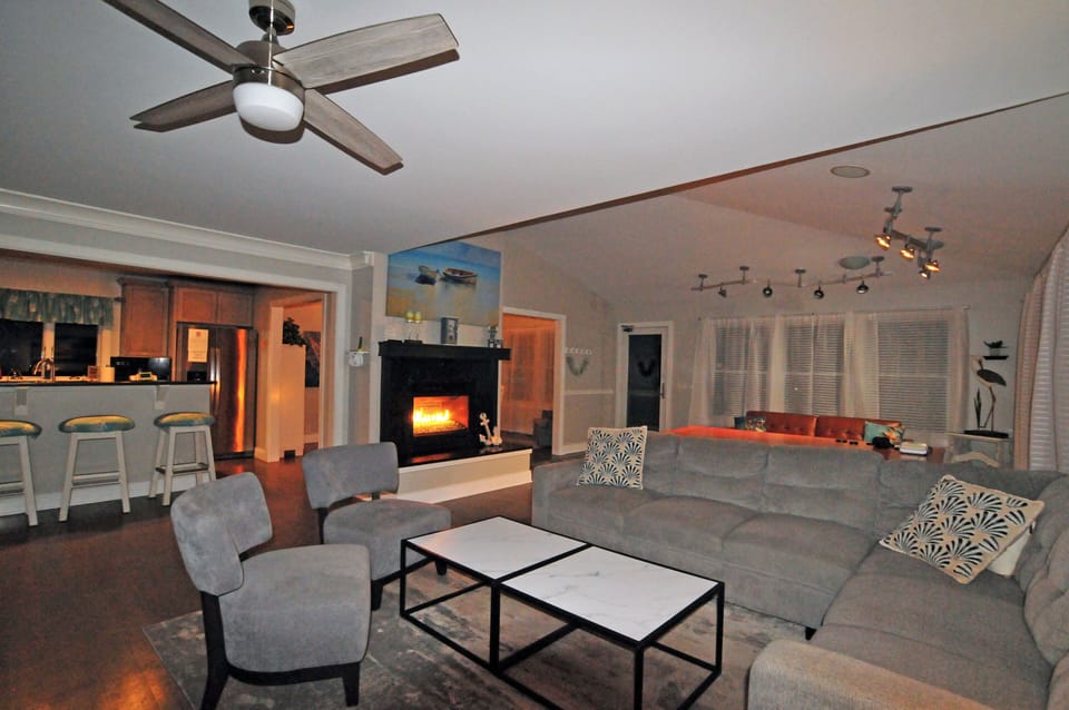 Spacious living room with fireplace.