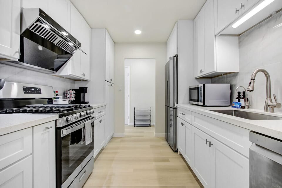 Cook up a storm in our fully-equipped kitchen with sleek, brand-new appliances waiting for your culinary creations.
