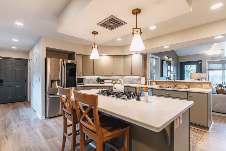 Dine in the comfort of home. Modern appliances, utensils & dinnerware await you.