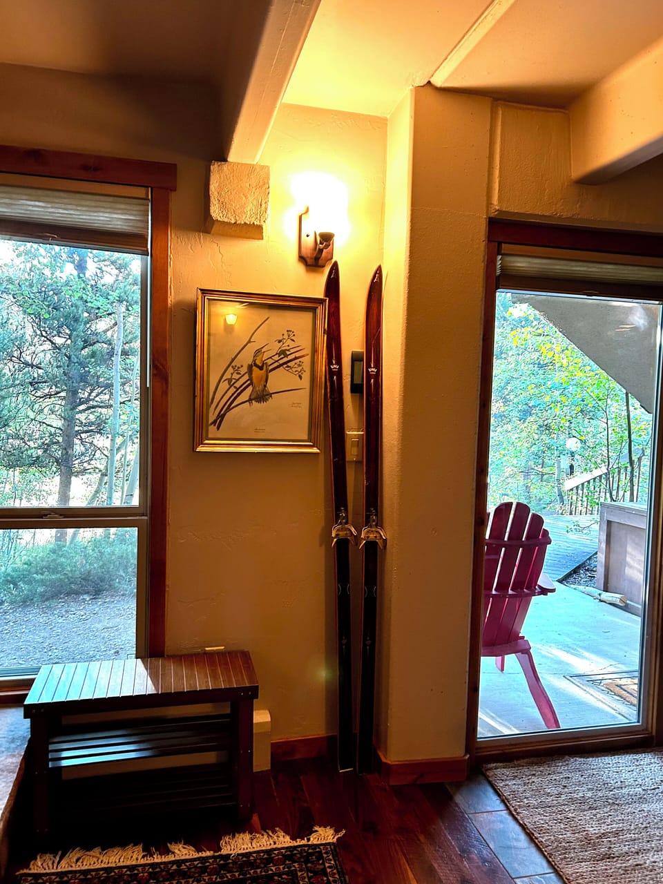 View from living area to front porch, where you can relax with morning coffee.