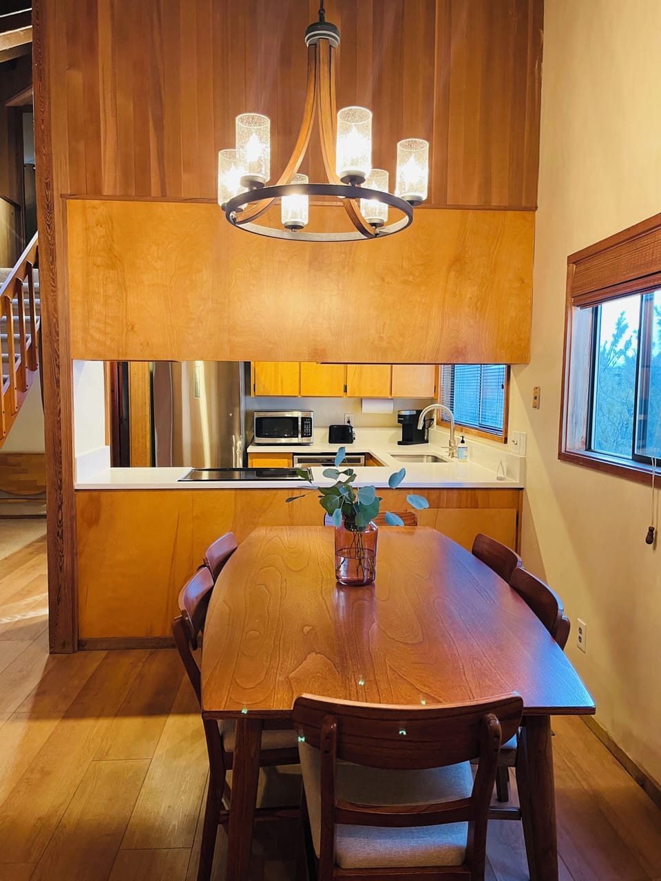 View of dining room and kitchen from entry way