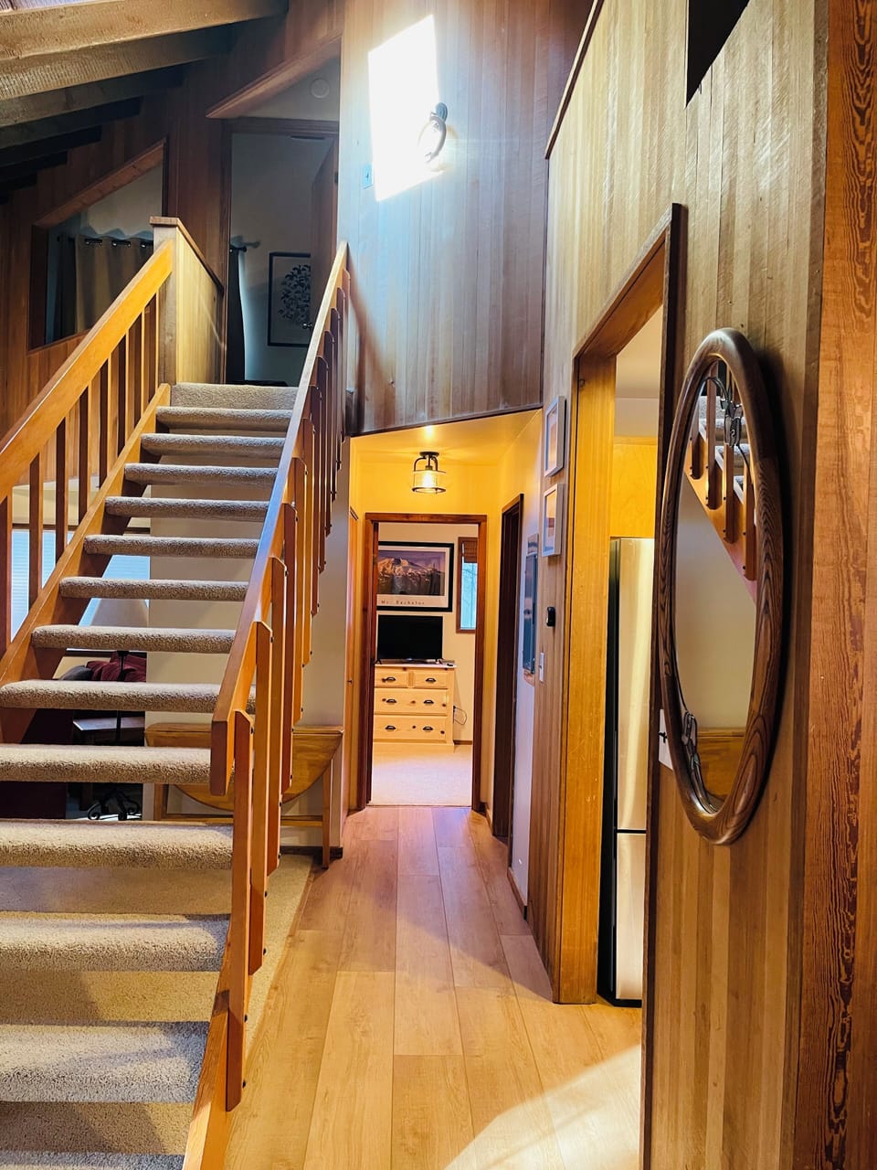 View of stairs and hallway from dining room area