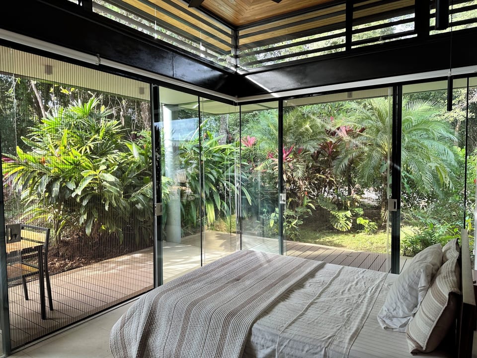Garden Bedroom with privacy blackout shades and lush gardens. 