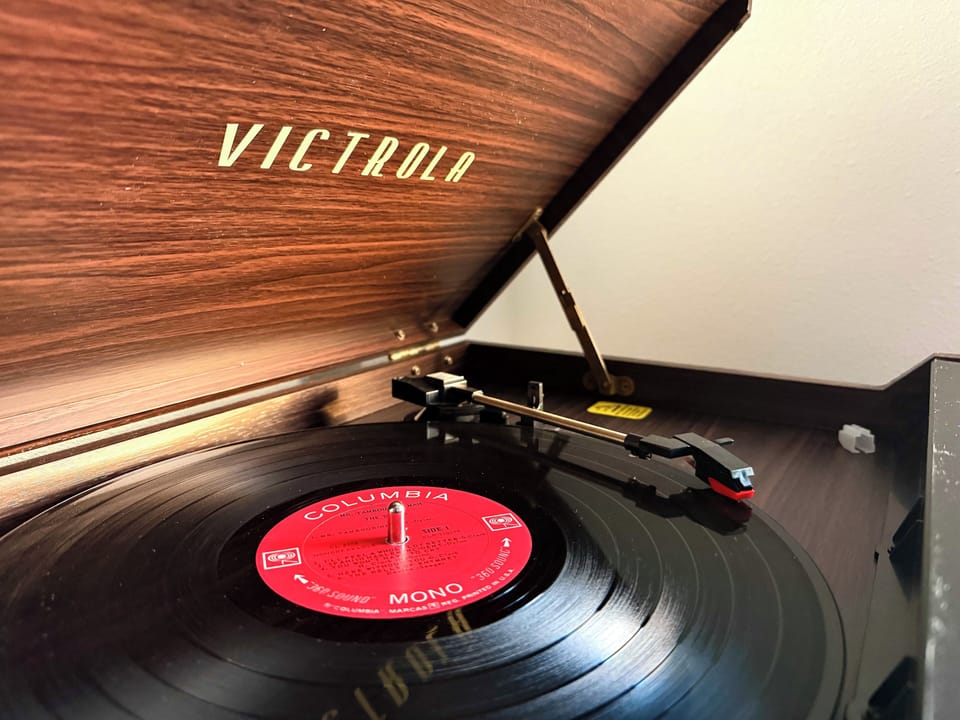 Enjoy your stay while spinning through our timeless record collection.