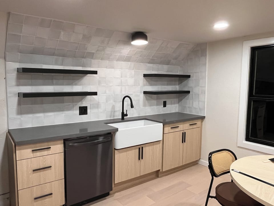 Modern kitchen with thoughtful design, open shelving, and Scandinavian-inspired decor.