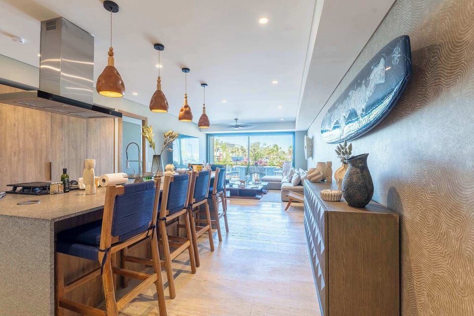 Cocina, desayunador y sala
