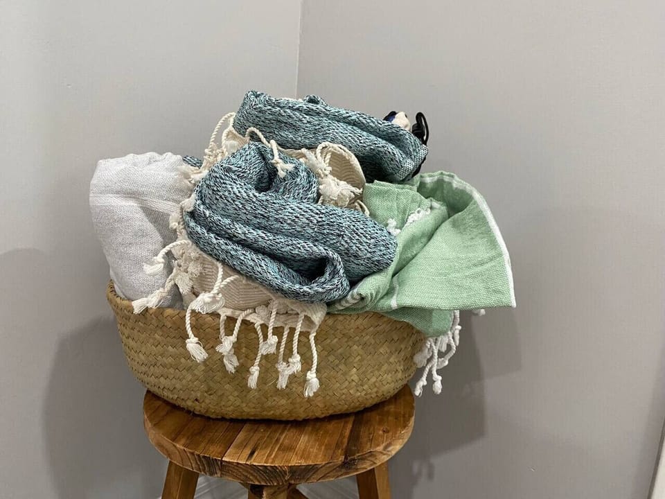 We`ve set out 10 of these amazing Turkish cotton beach towels.  Lightweight, fast drying, and sand shakes off cleanly.  You`ll love `em!  : )