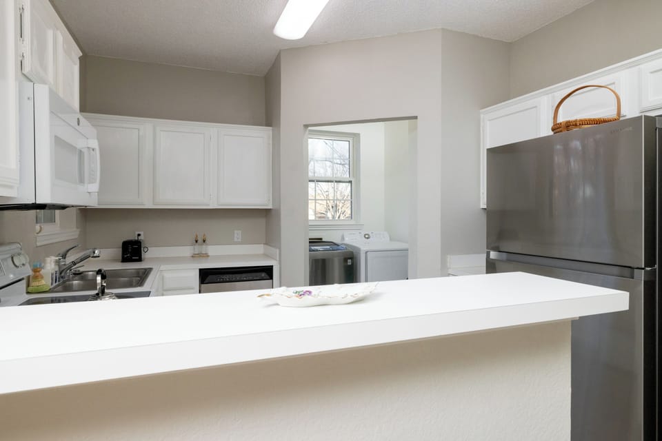 View of the kitchen and laundry room.