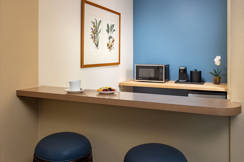Start mornings with fresh coffee from your in-room kitchenette nook.