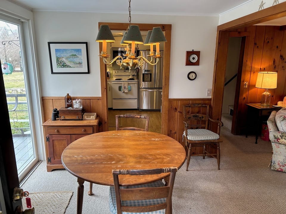 Dining room. Round table has a leaf to seat 8.