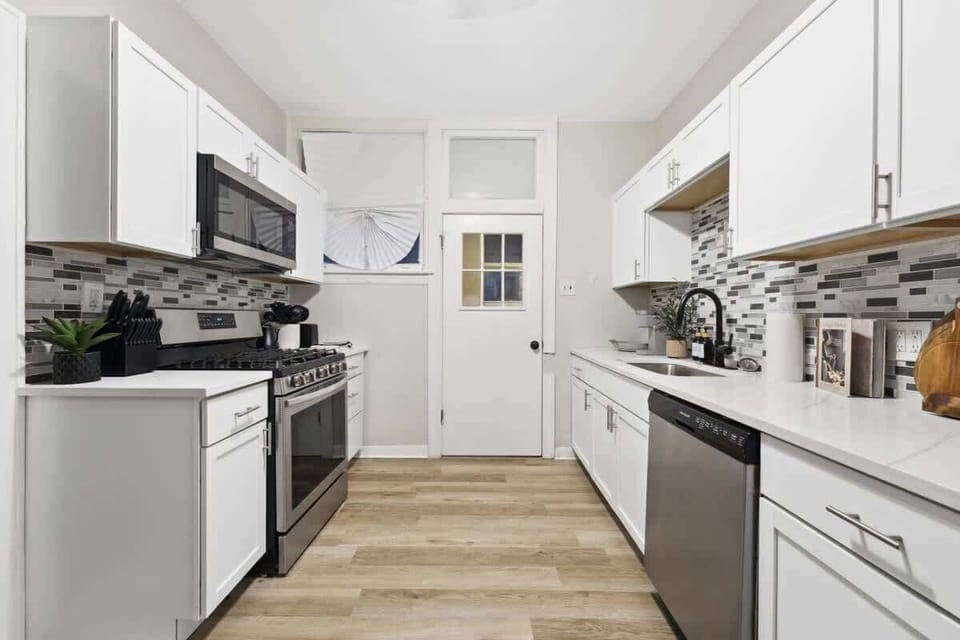 Fully stocked kitchen with everything you need to cook or reheat takeout from local spots!