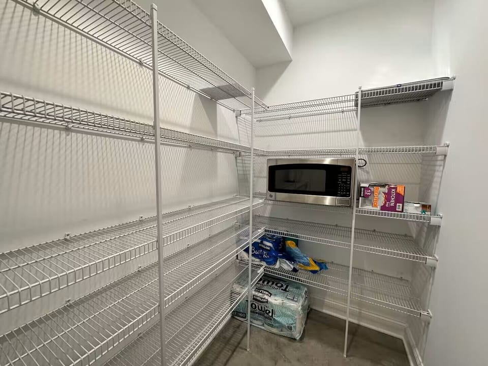 Lower level with kitchen / dining / living / half bath / patio to lake