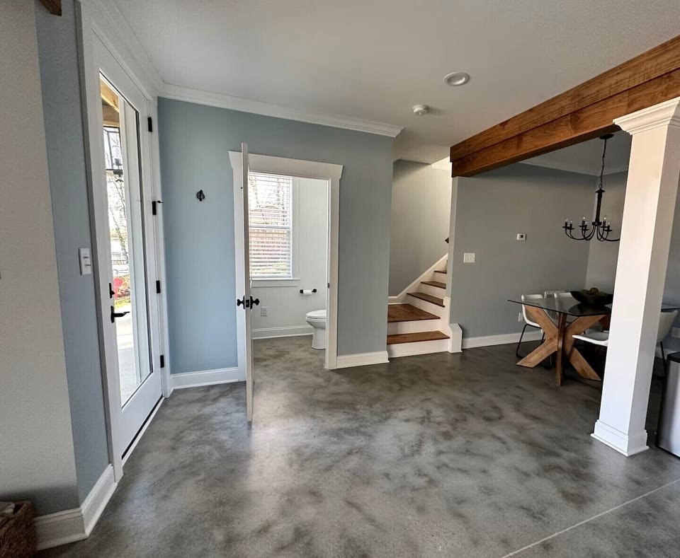 Lower level with kitchen / dining / living / half bath / patio to lake