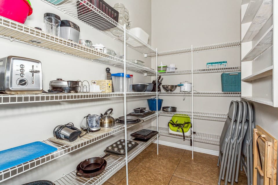 Huge oversized pantry with extra kitchen supplies