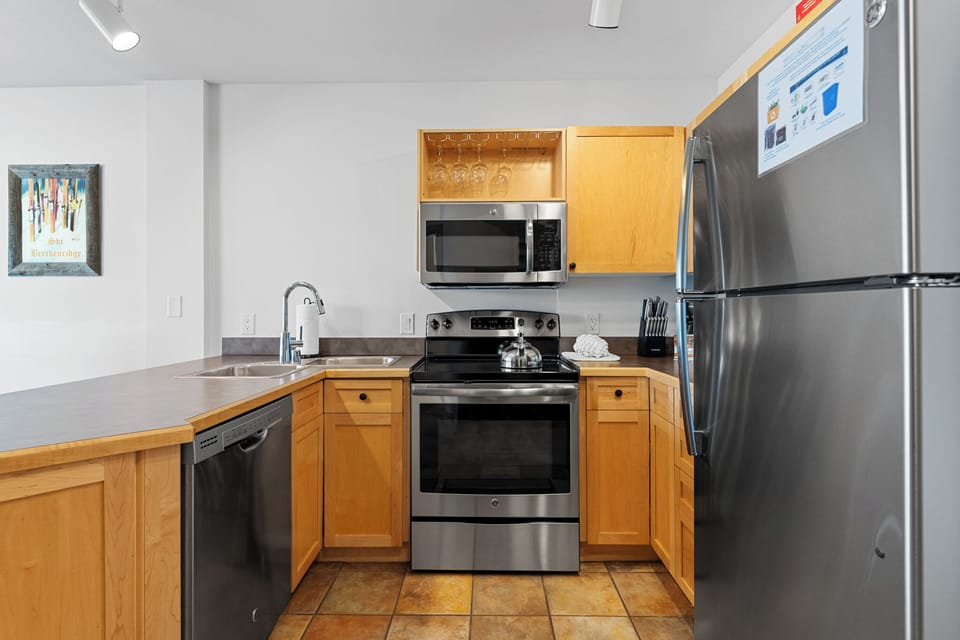Full kitchen featuring stainless steel appliances.