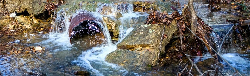 A babbling creek winds through the property, adding a tranquil soundtrack to your stay.