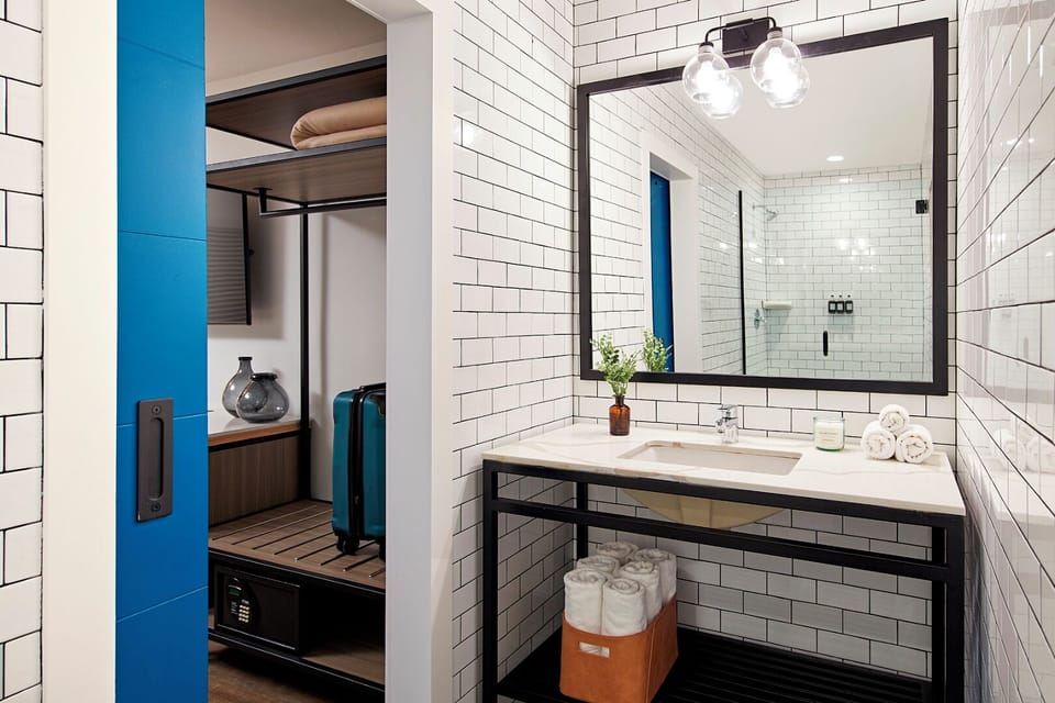 Refresh in a bright, spa-clean bath with plush towels.