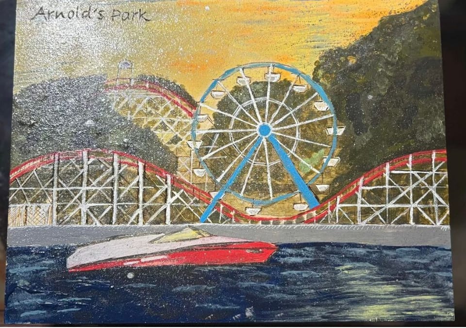 Some custom artwork of Arnold's Park that we cannot wait to hang in the house.