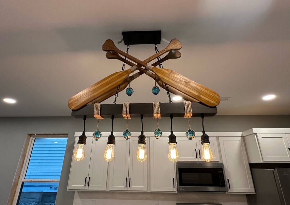 Custom light fixture in the new build house. We are bringing you along the journey as this house is being built.