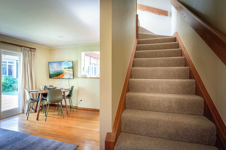Dining Room & Stairs to the Bedroom