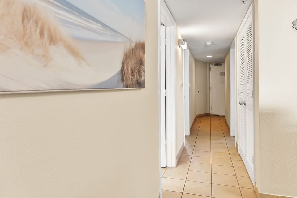 Hallway leading to the condo bedrooms.
