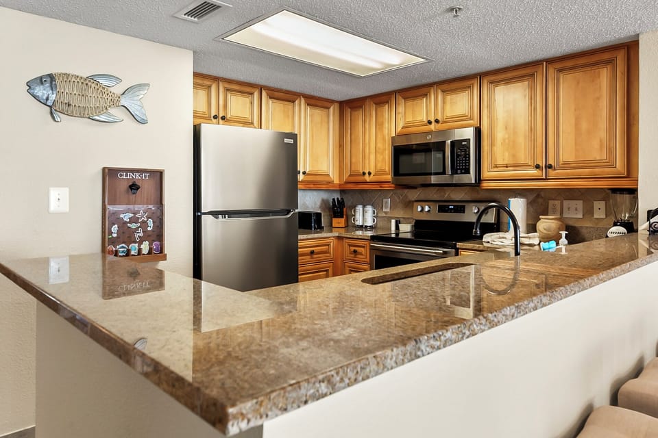 Fully-equipped kitchen with large counter space for evening meals and entertainment!