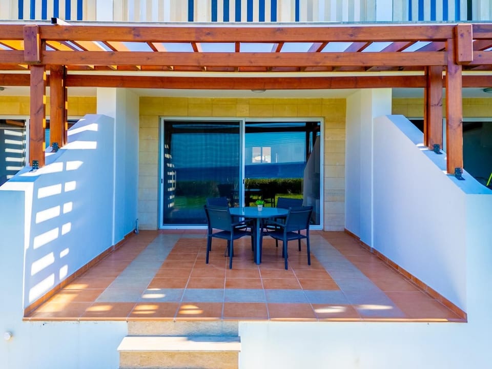 A straightforward, centered perspective of the ground-floor veranda, highlighting the clean structural layout and symmetrical design of the private patio.