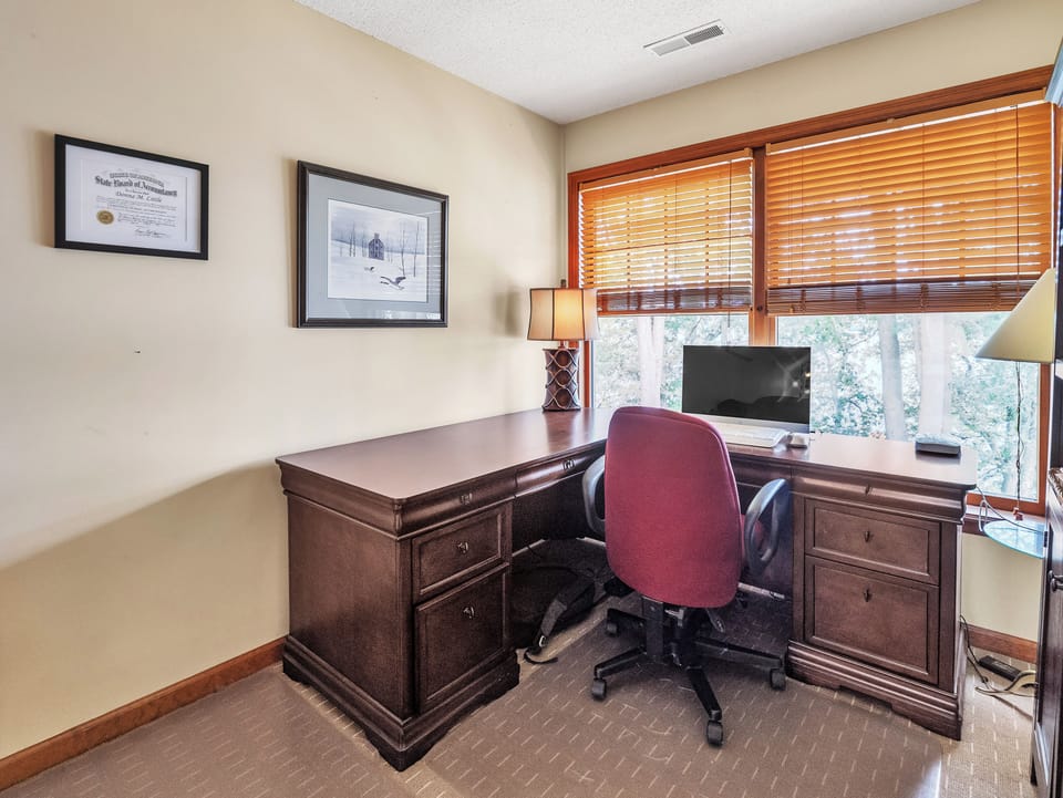 Loft office area with panoramic lake views (computer not included)