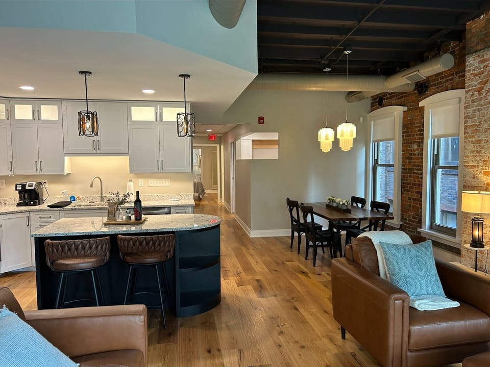 Spacious open floor plan combines kitchen, dining, and living spaces