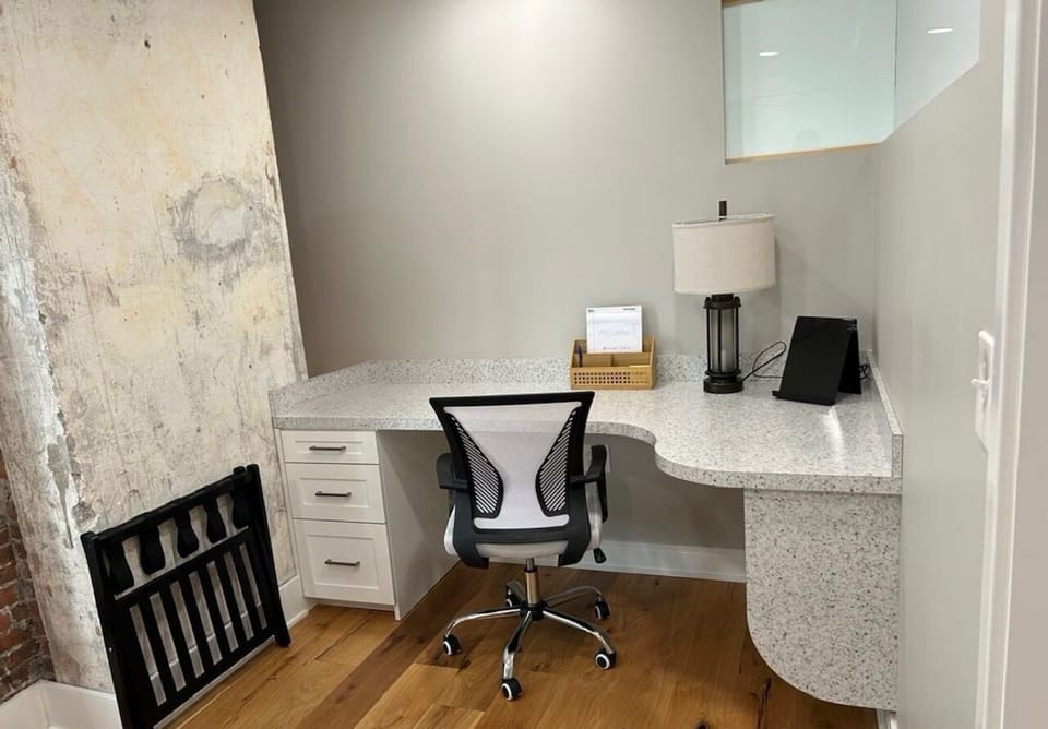 Built in workspace with fast wifi and basic office supplies furnished