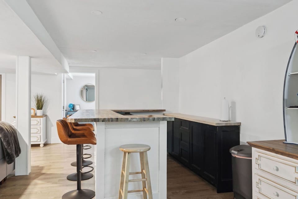 Cook up lakeside memories in this modern, open kitchen.
