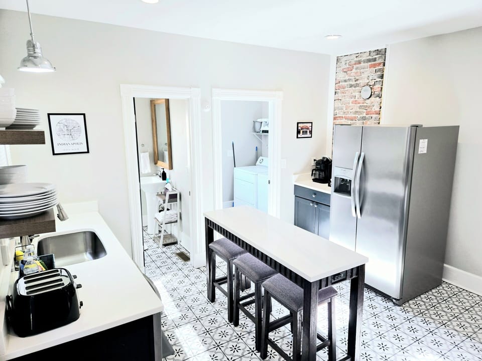 Fully stocked kitchen with all the essentials to prepare a home cooked meal.