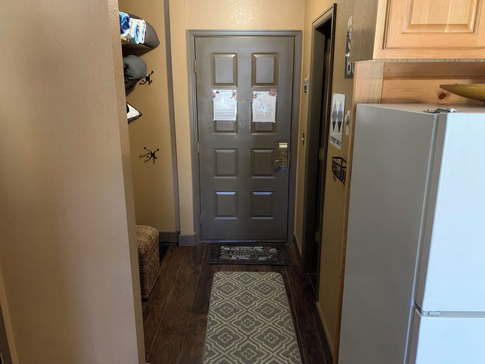 Hallway with Storage (Left) and Full Bathroom 2 (Right)
