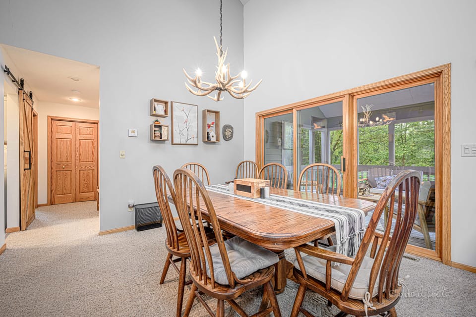 Dining room opens up to the screened in porch 