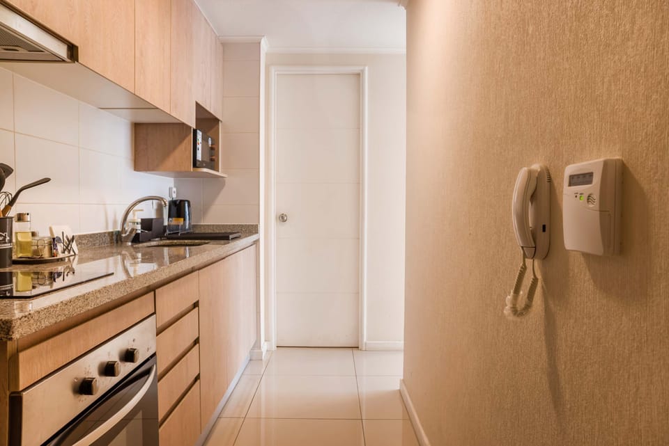 Modern and efficient kitchen with all essentials for a comfortable stay.