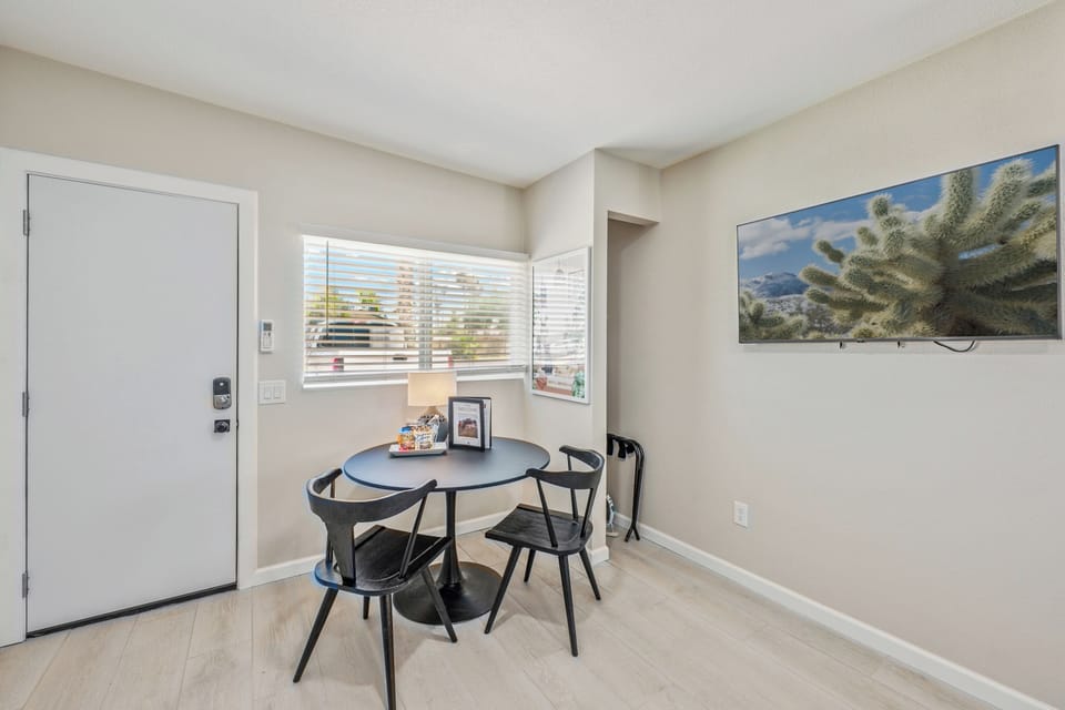 Dining space with a view of the quiet and trendy neighborhood.