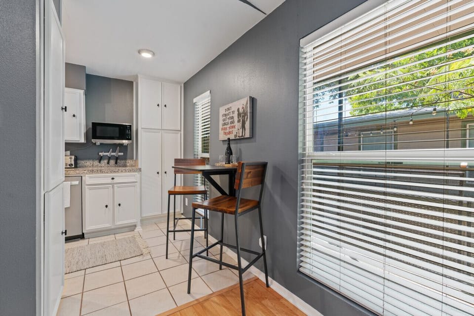 A compact dining and work station combo, ideal for multitasking in a cozy corner.