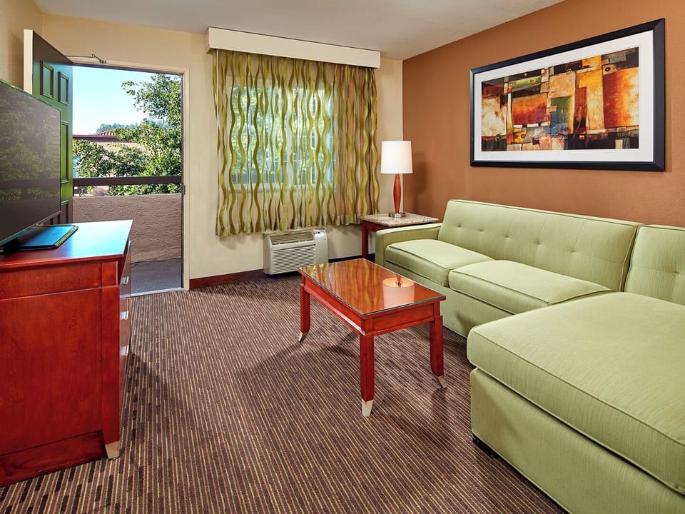 Living area. Exact unit will be assigned upon arrival. Views, colors, and decor may vary.