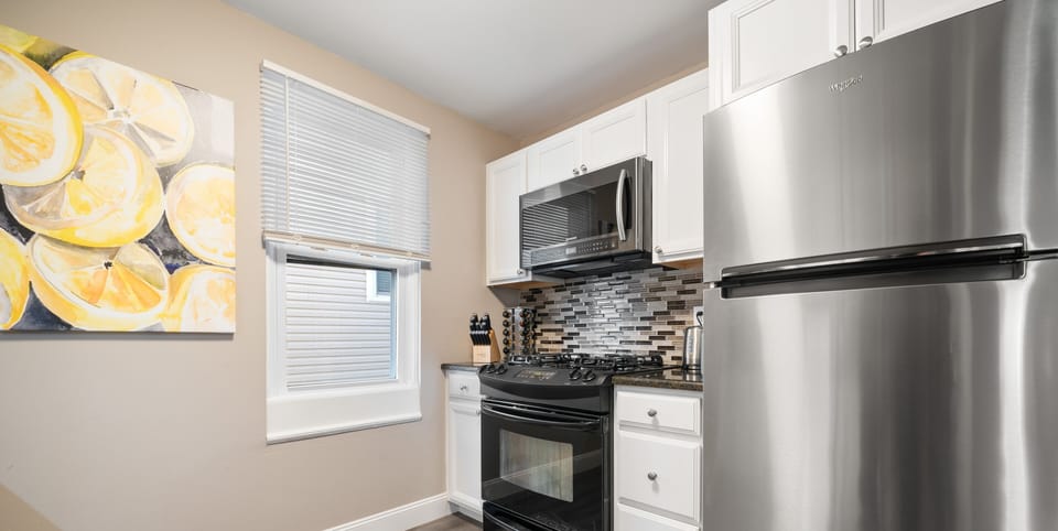 Oven, stove, fridge and microwave.
