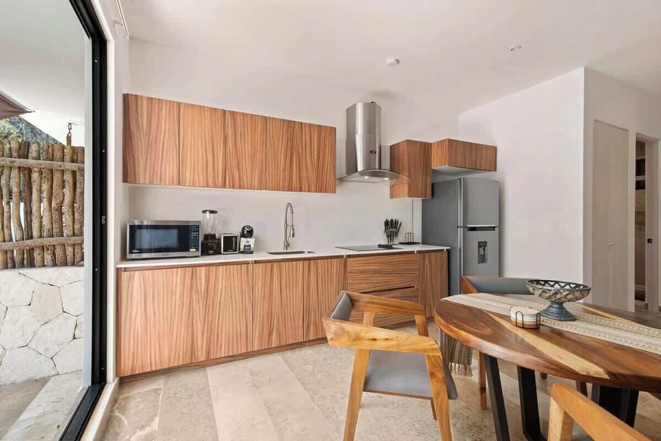 Chef’s Delight – Fully Equipped Kitchen - Create culinary masterpieces in our spacious, modern kitchen, ideal for preparing any meal.
