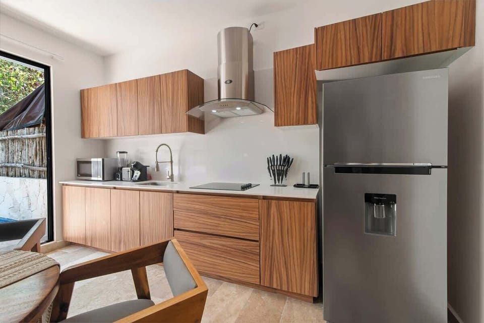 A Culinary Haven - Modern appliances and spacious countertops make cooking a breeze in this well-appointed kitchen.
